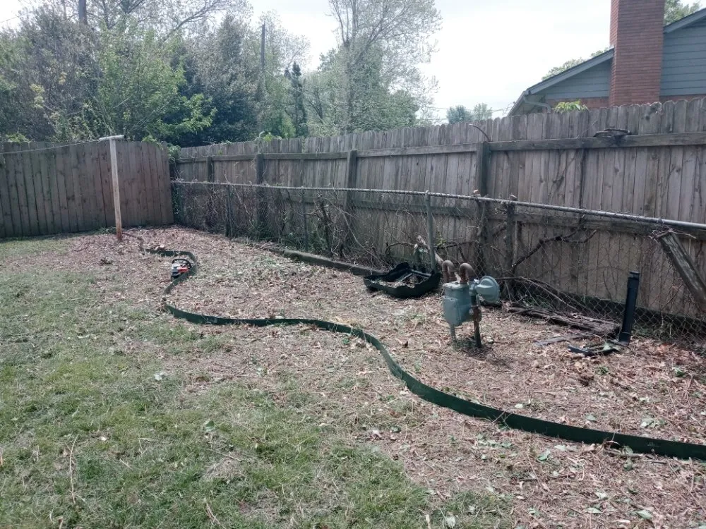 Custom yard cleanup service for year-round maintenance in Tulsa, OK by Quimbys's Lawn & Tree Service