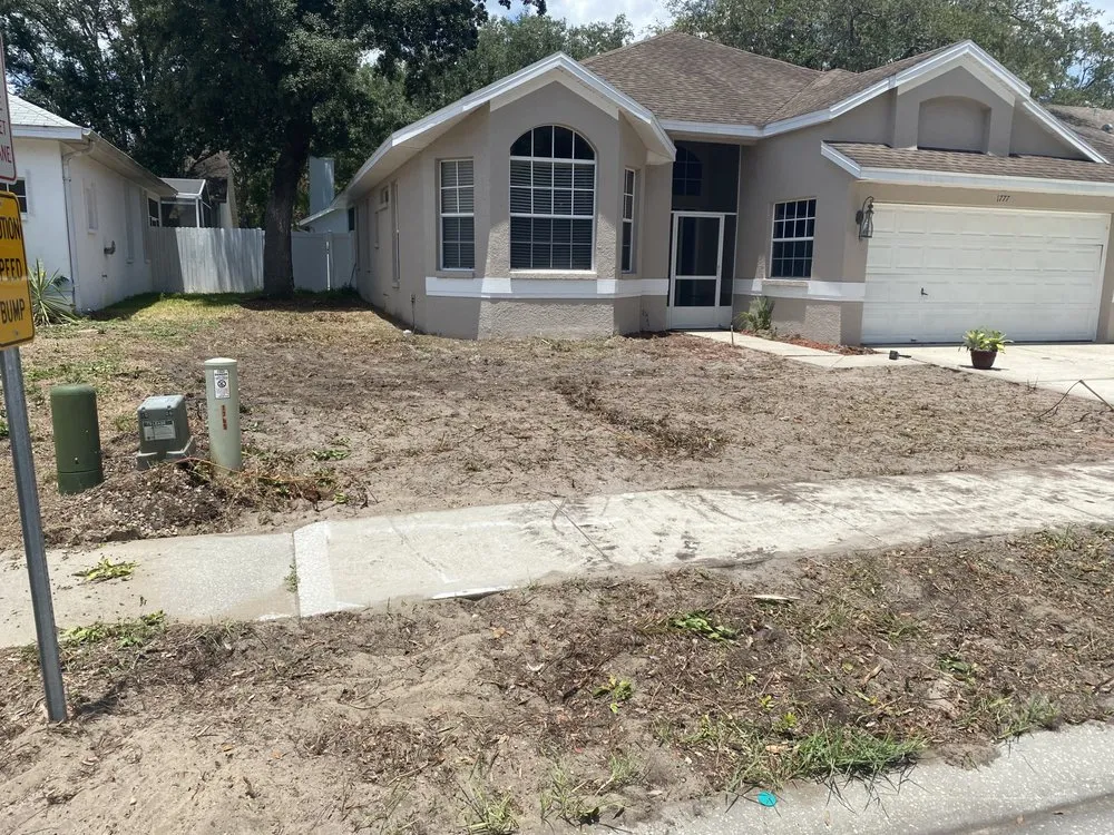 Professional lawn mowing service for homes in Hudson, FL by Quinning Lawn Service And Property Maintenance