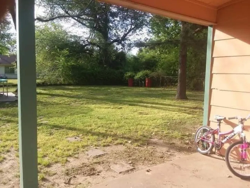 Local lawn mowing service with custom design in West Memphis, AR by Quinn's Landscaping