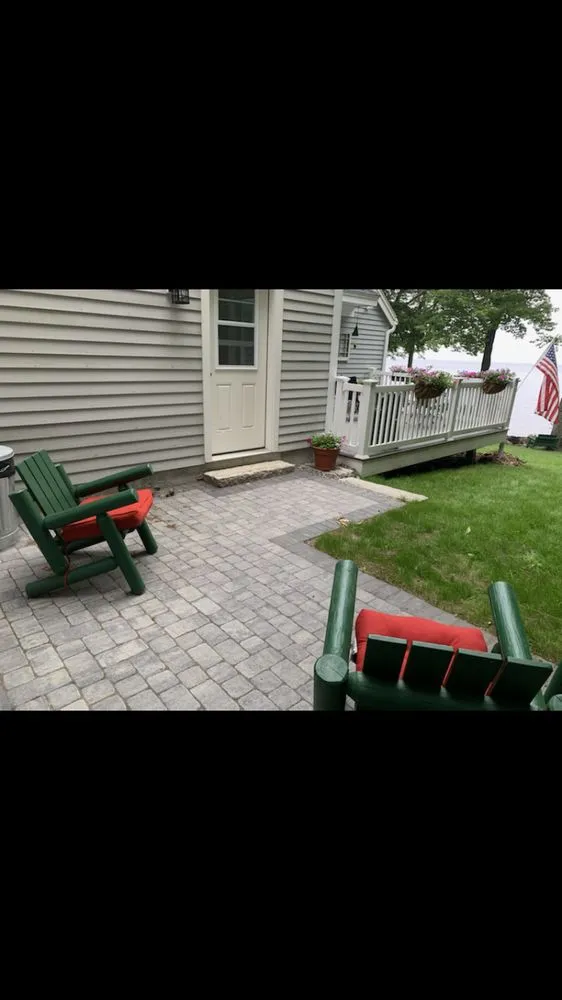 Expert lawn mowing service for homes in Westbrook, ME by Quinn's Stoneworks & Landscape