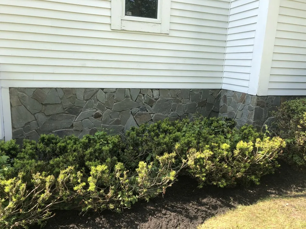 Expert yard cleanup service in Westbrook, ME by Quinn's Stoneworks & Landscape