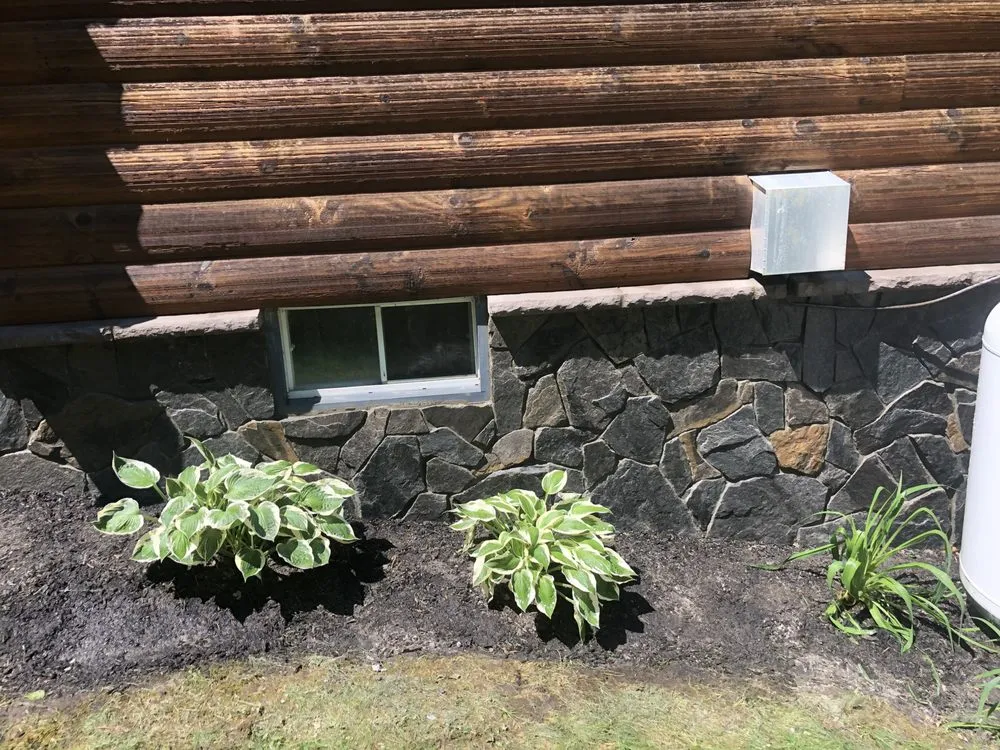 Custom outdoor landscaping for year-round maintenance across Westbrook, ME - Quinn's Stoneworks & Landscape