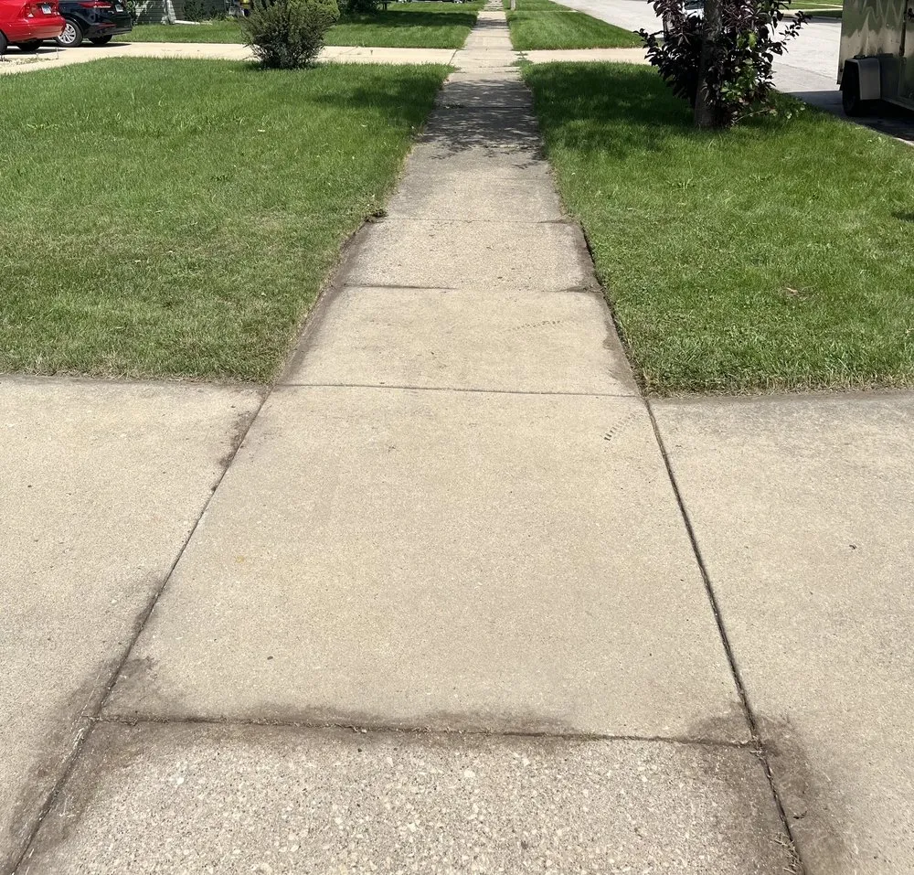 Trusted residential landscaping for year-round maintenance in Aurora, IL by Quintessential Lawn Care