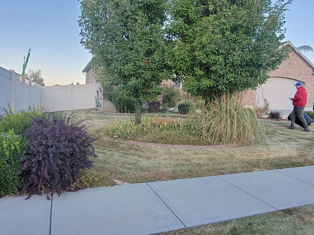 Custom outdoor landscaping for homes in South Ogden, UT by R & J's Upkeep Service LLC