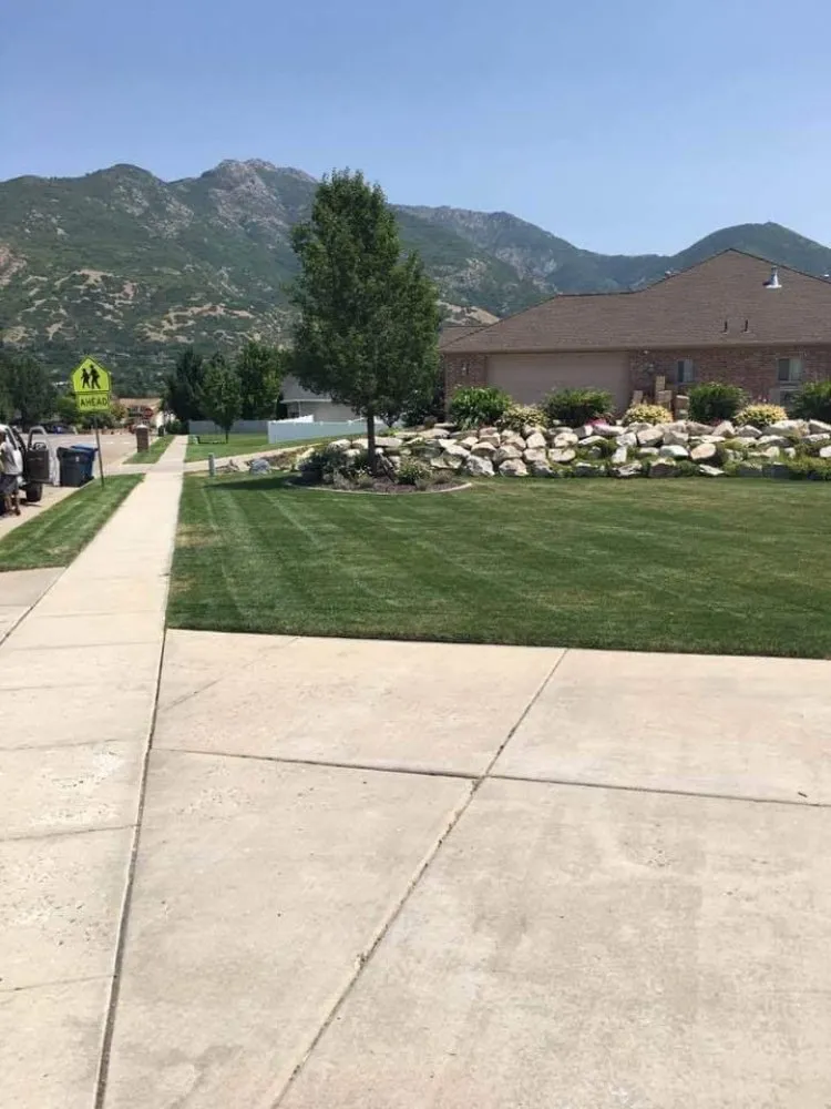 Trusted lawn mowing service experts serving South Ogden, UT - R & Js Upkeep Service