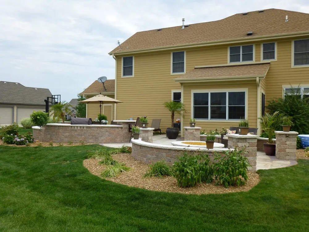 Custom landscaping services for homes in Franksville, WI by R & R Enterprises