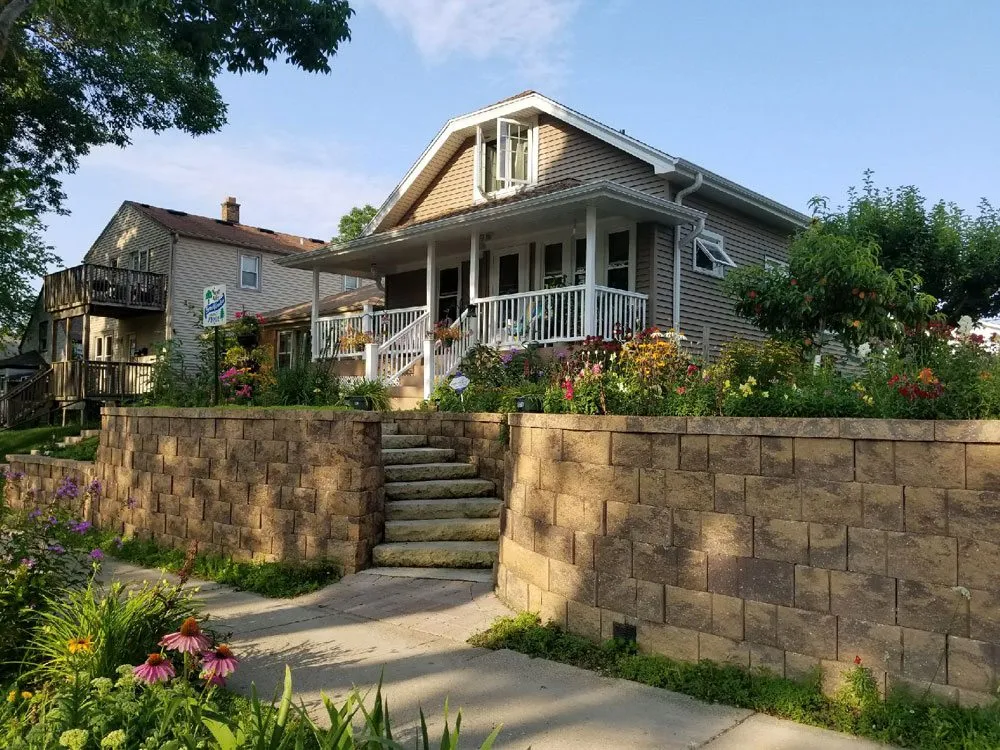 Local yard cleanup service with custom design in Franksville, WI by R & R Enterprises