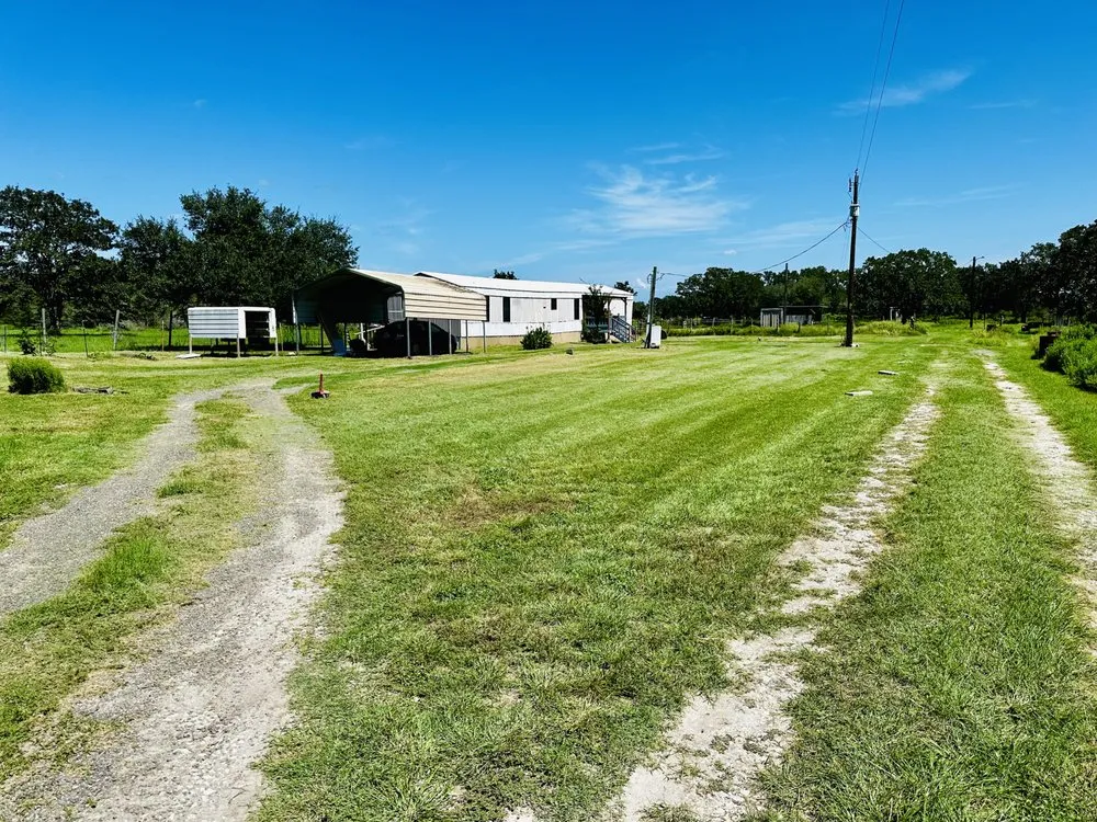 Reliable landscaping services for homes across Bryan, TX - R & R Lawn Care