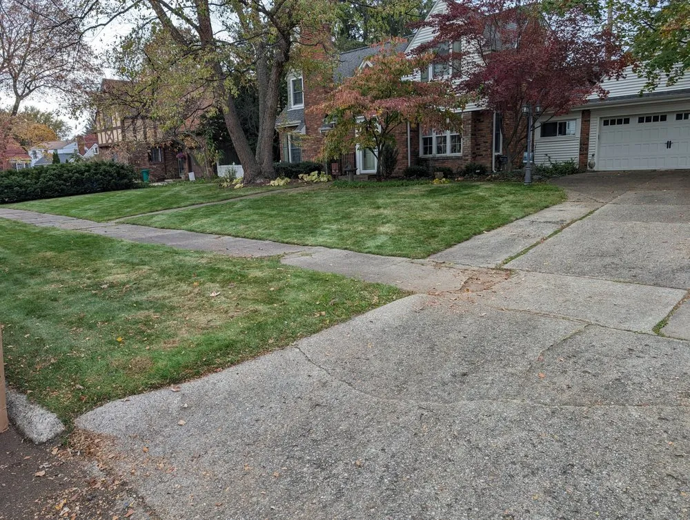 Professional landscape installation with custom design across Flint, MI - R & R Lawn Maintenace