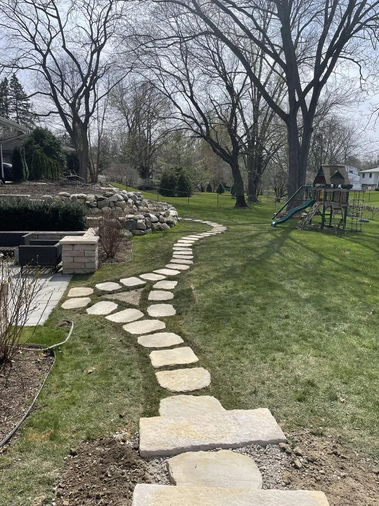 Custom landscaping services for year-round maintenance across Flint, MI - R A Hardscape