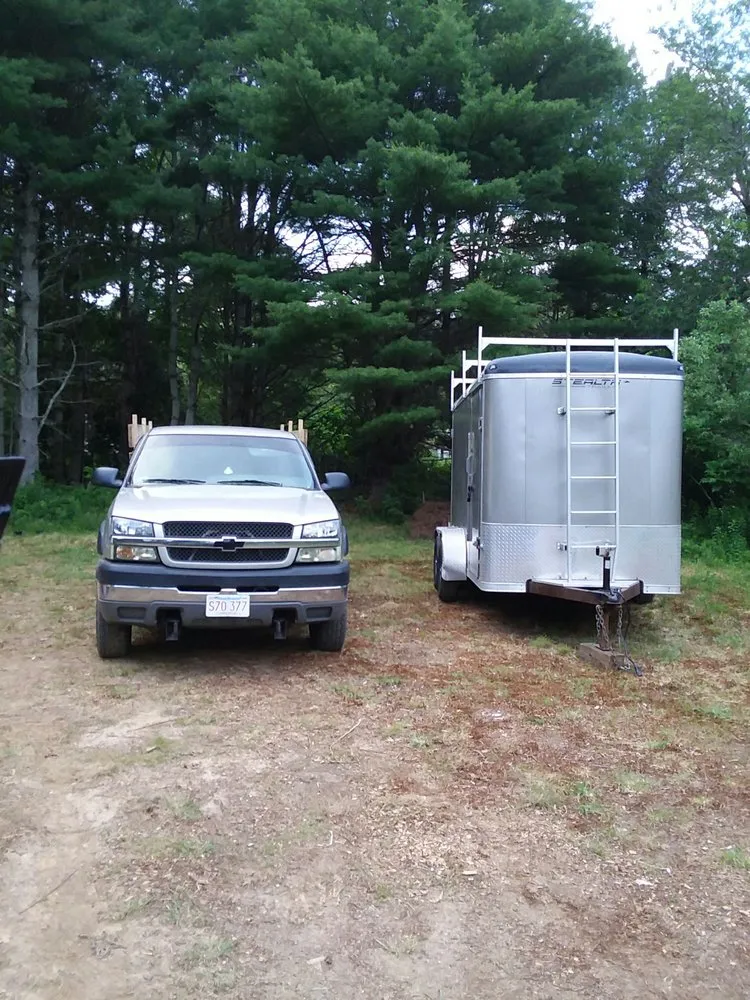 Custom outdoor landscaping for year-round maintenance in East Falmouth, MA by R and B Home and Yard Services