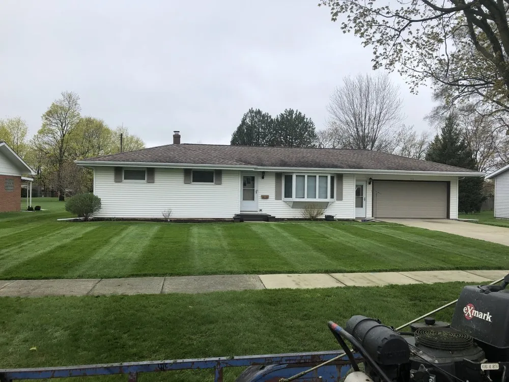 Custom lawn mowing service for beautiful yards across Flint, MI - R and R landcare
