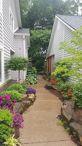 Trusted lawn mowing service for homes in Indianapolis, IN by R D Tisdale landscaping company