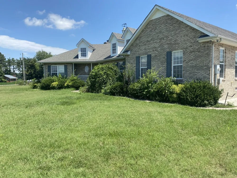 Trusted lawn mowing service for homes in Manchester, TN by R n B Lawn Service