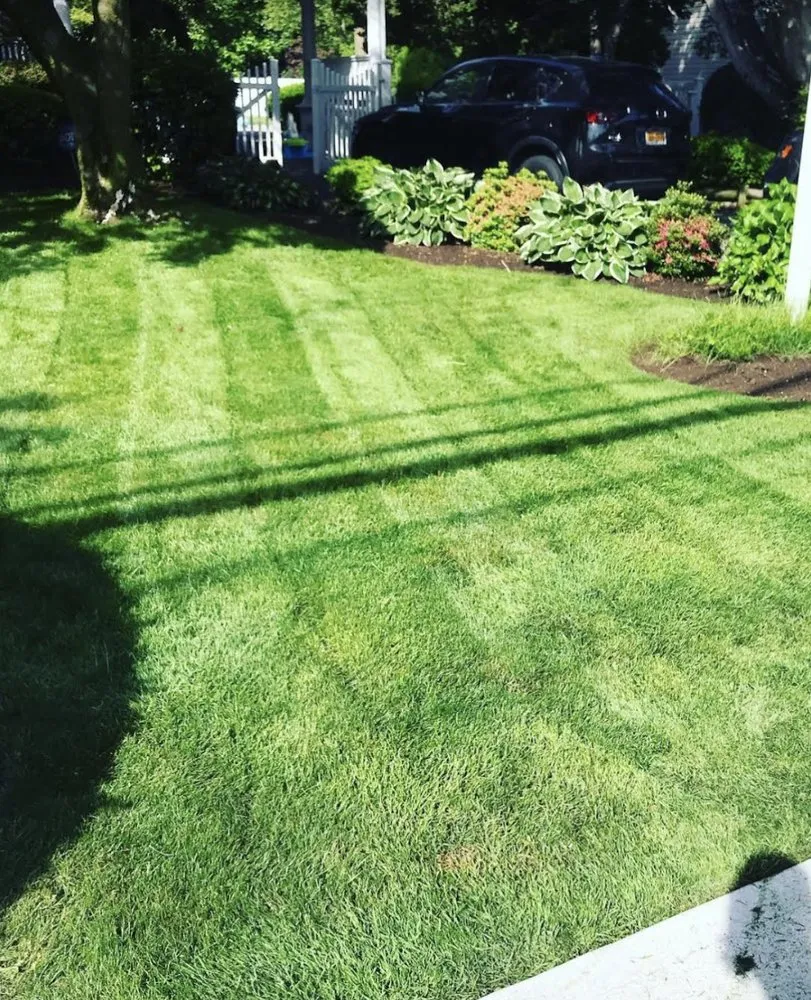 Custom landscape installation in North Babylon, NY by R Rodriguez #1 Landscaping