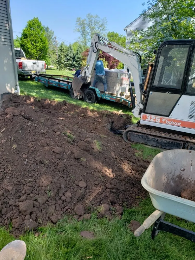 Custom landscape installation in Bound Brook, NJ by R Valverde Landscaping and Tree