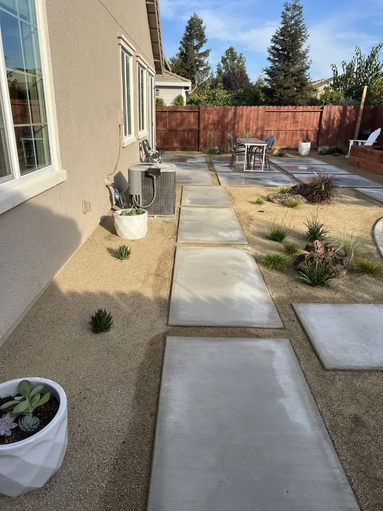 Affordable yard cleanup service for year-round maintenance in Woodland, CA by R&A Landscape Design and Construction