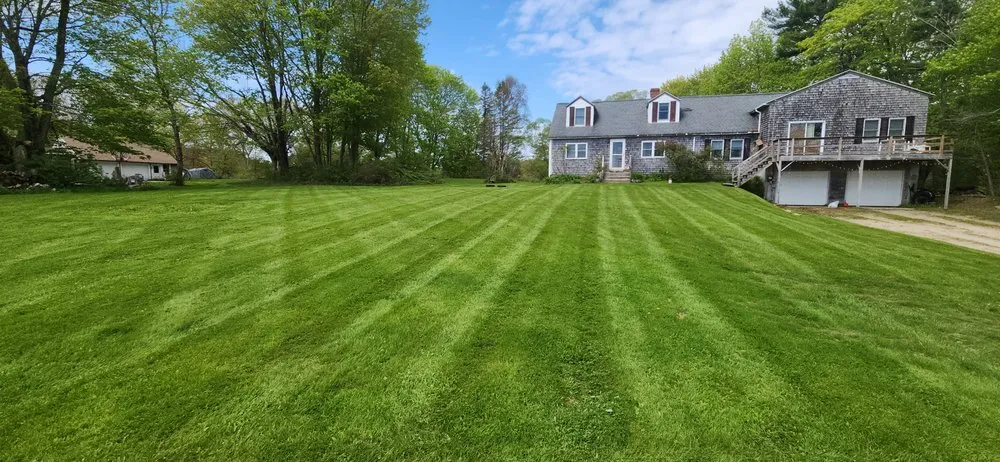 Custom lawn mowing service for year-round maintenance in Winthrop, ME by RA Mowing