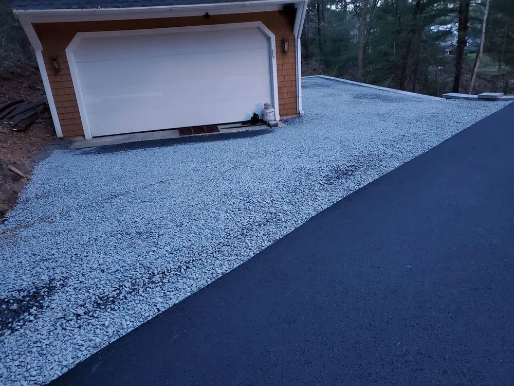 Reliable lawn mowing service for homes in Plymouth, MA by Rafe Veiga Construction