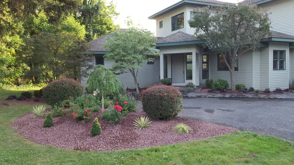 Custom garden landscaping for year-round maintenance across Oswego, NY - Raffa Landscaping and Design