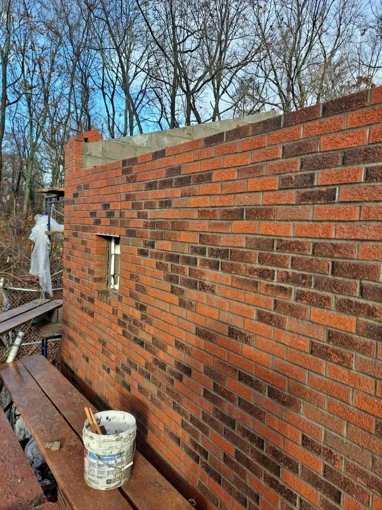 Custom garden landscaping for year-round maintenance in Oceanside, NY by Raffaele Outdoor Concepts