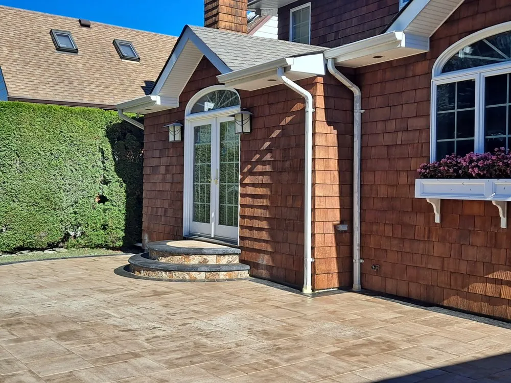 Trusted lawn mowing service for residential properties in Oceanside, NY by Raffaele Outdoor Concepts