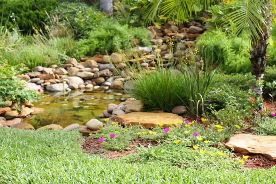 Trusted lawn mowing service with custom design across McAllen, TX - Rain Hunters Landscaping