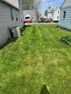 Trusted lawn mowing service for homes across Lima, OH - Rain or shine LawnCare