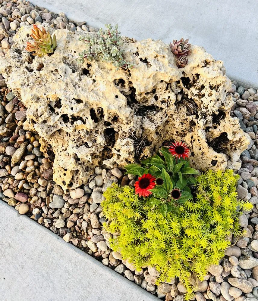 Custom outdoor landscaping with custom design in Lincoln, NE by Rain, Sun & Us Landscaping