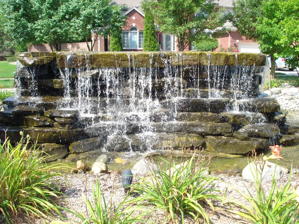 Custom lawn care service for year-round maintenance in Shelby Township, MI by Rainbow Landscaping