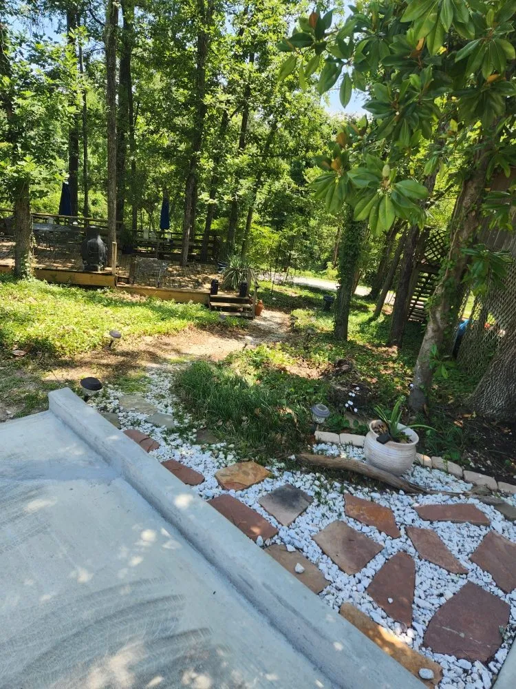 Custom yard cleanup service for outdoor upgrades in Livingston, TX by Rainbows Yard Maintenance