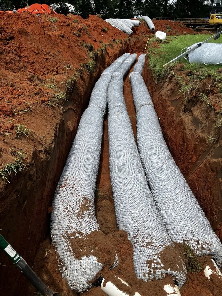 Reliable landscaping services in Lucedale, MS by Rainey Farms and Construction