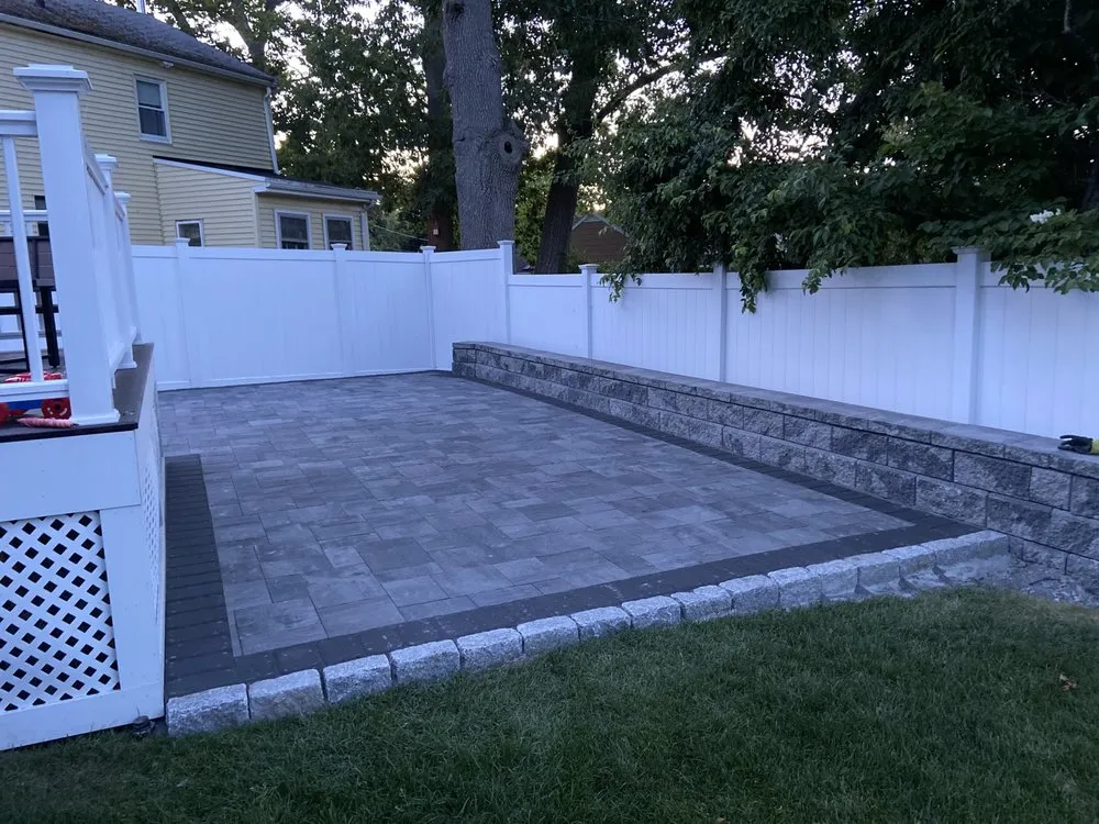 Trusted yard maintenance for homes in Holliston, MA by Rainforest Landscape