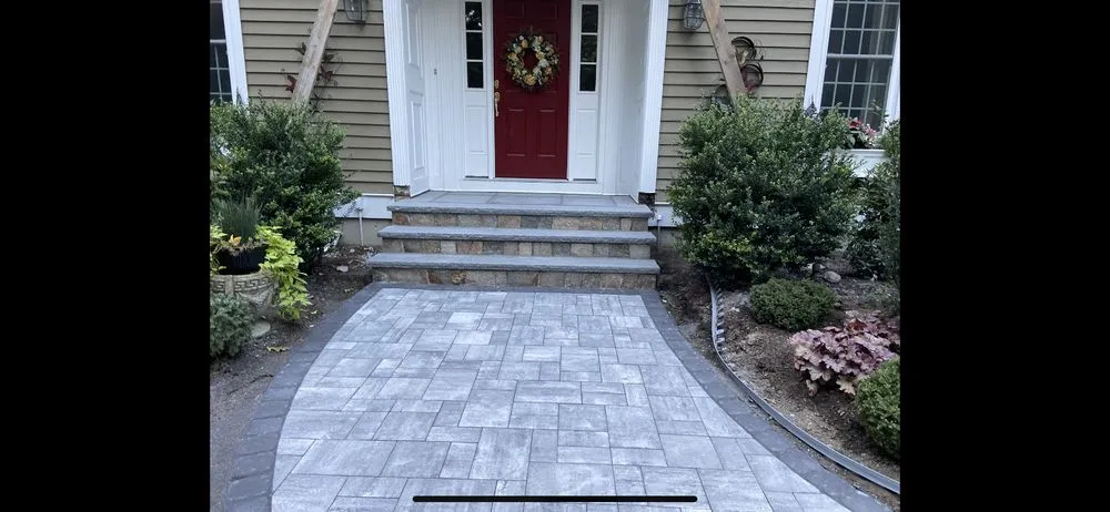 Top-rated lawn care service with custom design in Holliston, MA by Rainforest Landscape