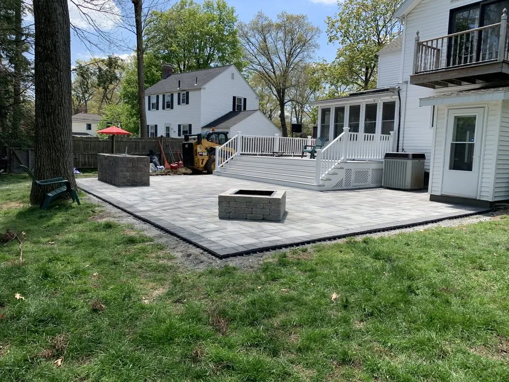 Trusted lawn care service for beautiful yards in Holliston, MA by Rainforest Landscape