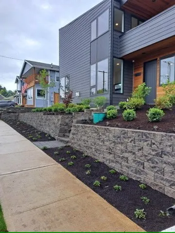 Professional lawn mowing service with custom design in Covington, WA by Rainforest Rock Design