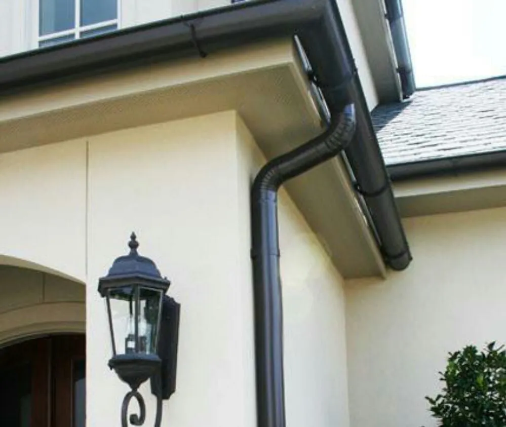 Custom lawn mowing service for residential properties in Austin, TX by Raintree Seamless Gutters