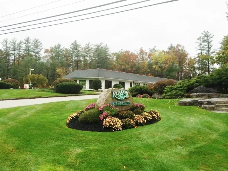 Custom landscape installation with custom design across Merrimack, NH - Raisanen Landscaping