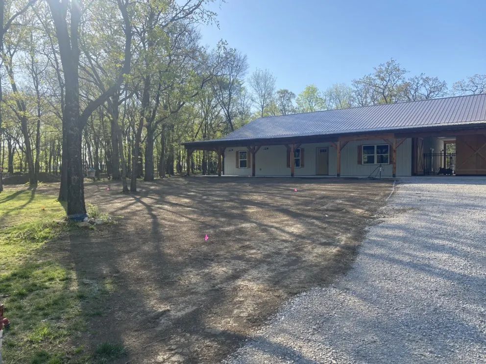 Custom landscape design for outdoor upgrades in Tulsa, OK by Raising Blades Sod