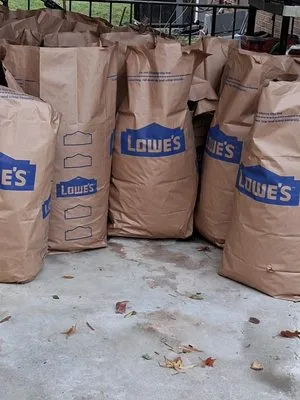 Raking It In Labor Solutions Logo