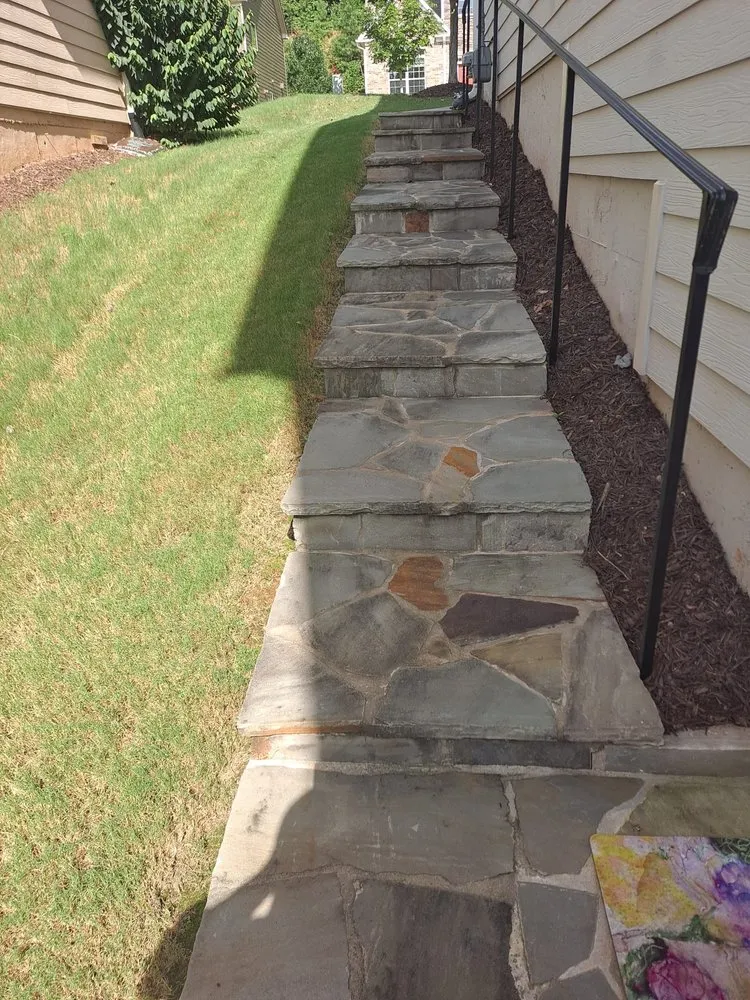 Professional landscape installation in Dunwoody, GA by Ramirez Hardscaping and Tree services