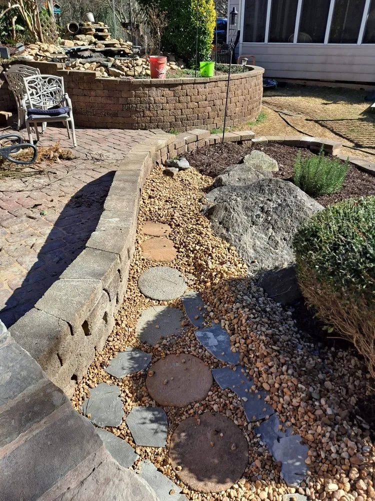 Local landscape installation for year-round maintenance in Dunwoody, GA by Ramirez Hardscaping and Tree services