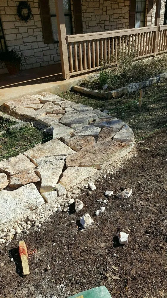 Custom garden landscaping for year-round maintenance in San Marcos, TX by Ramirez Lawn & Landscaping