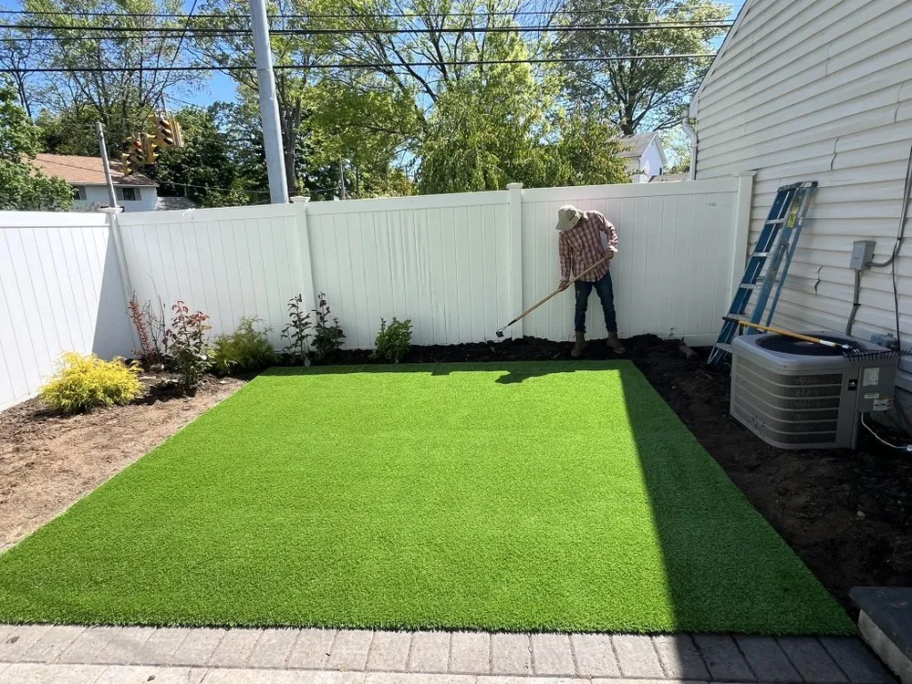 Affordable yard cleanup service for year-round maintenance in Brentwood, NY by Ramos Property Management