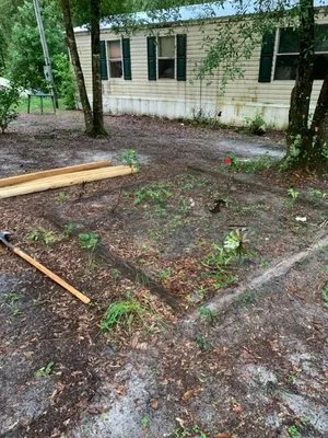 Rare Earth Lawn Care Logo