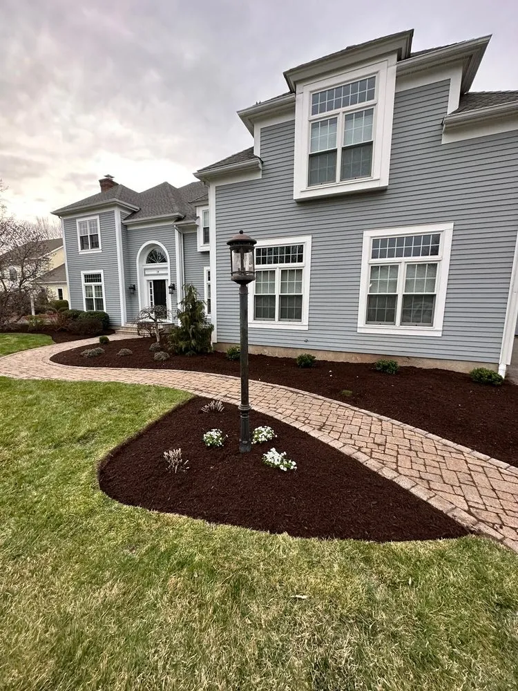 Affordable lawn care service for residential properties in West Hartford, CT by Raupp Landscape
