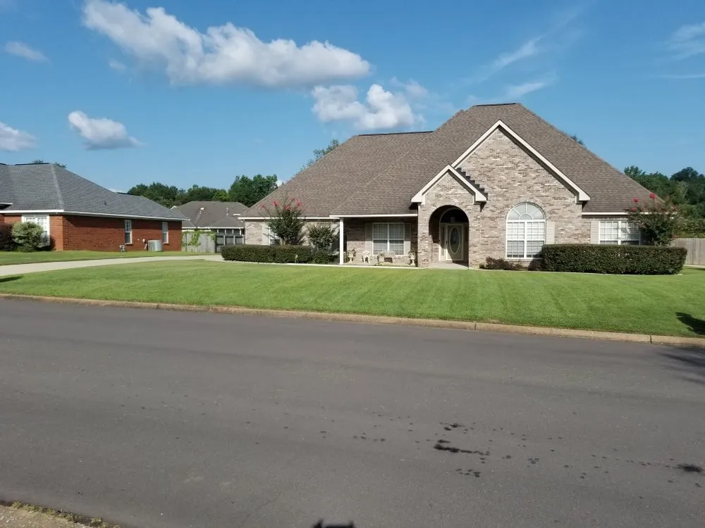 Expert lawn mowing service for year-round maintenance across Tuscaloosa, AL - Ray of Hope Properties