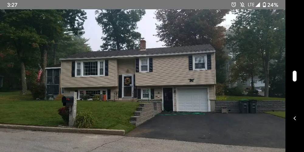 Custom landscape design for year-round maintenance in Chelmsford, MA by Raymond F Bouley