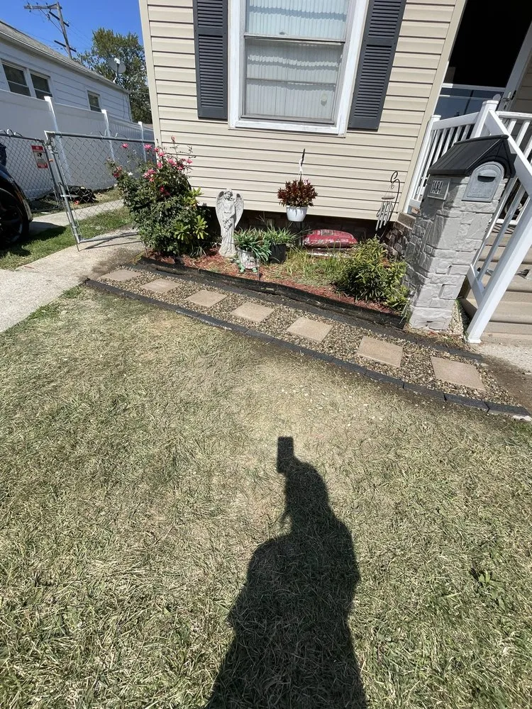 Reliable lawn mowing service for residential properties across Wyandotte, MI - Raymonds Lawn Care and Maintenance