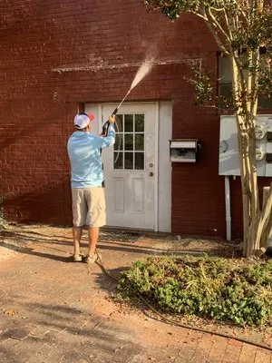 Raynor Lawn Care and Pressure Washing Logo